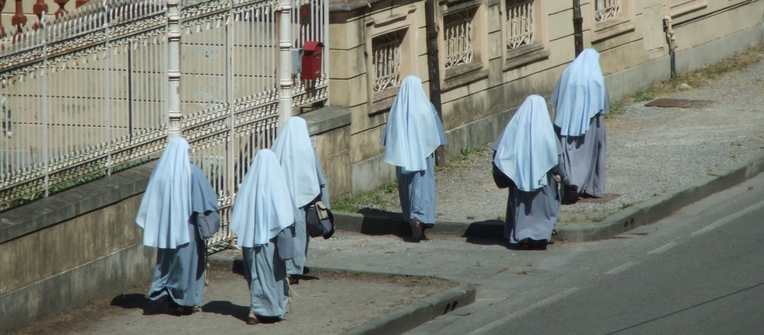 Six Nuns walking to a Convent in Lucca