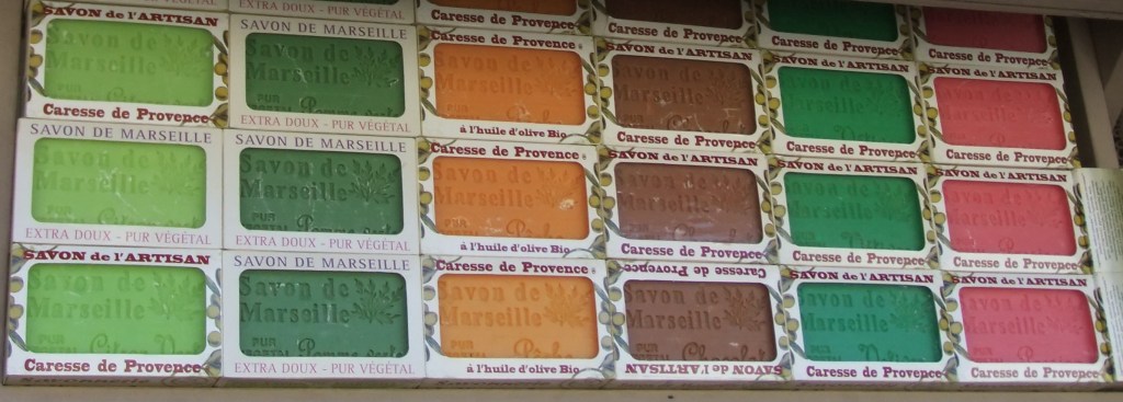 Different coloured soap bars, lime, green, orange, brown, another green and pink